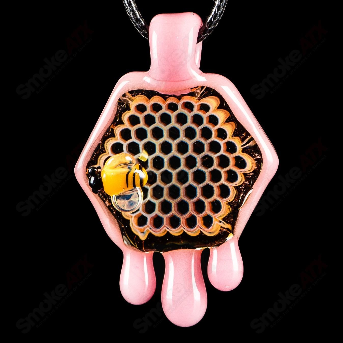 Joe P Glass Cadillac Pink 2-inch honeycomb drip pendant, vibrant heady glass jewelry with intricate design.