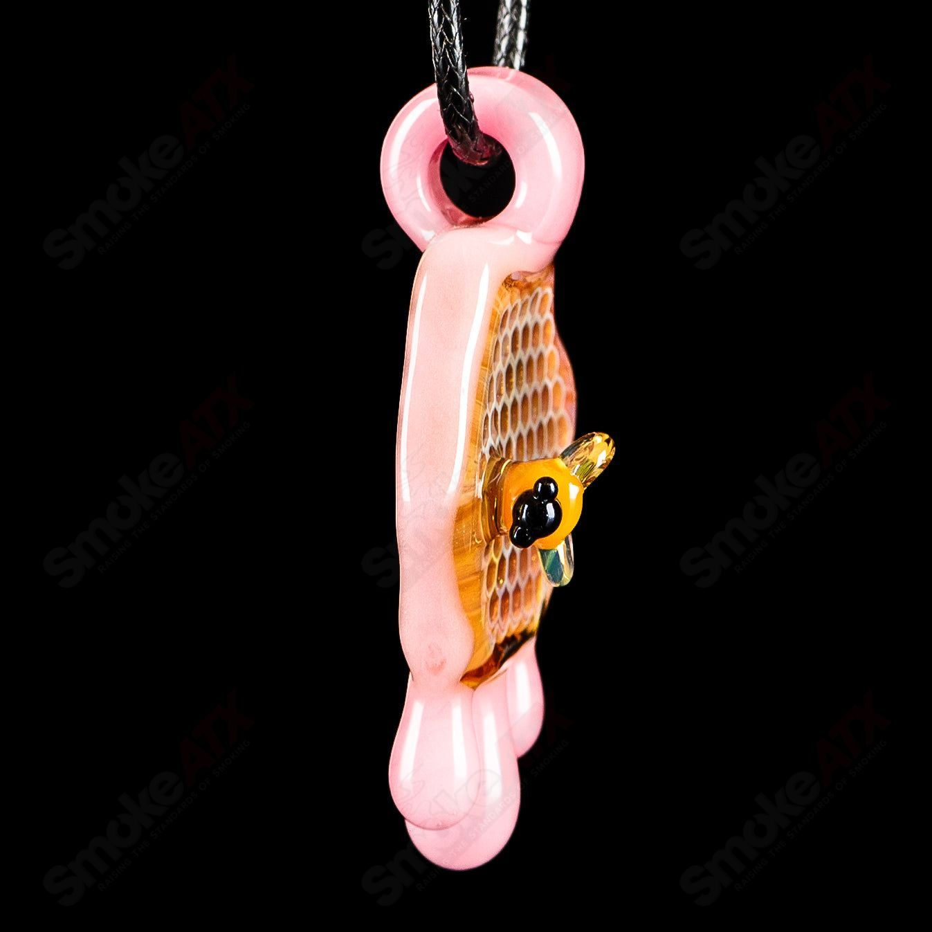 Joe P Glass Cadillac Pink 2-inch honeycomb drip pendant, colorful heady glass jewelry with intricate design.