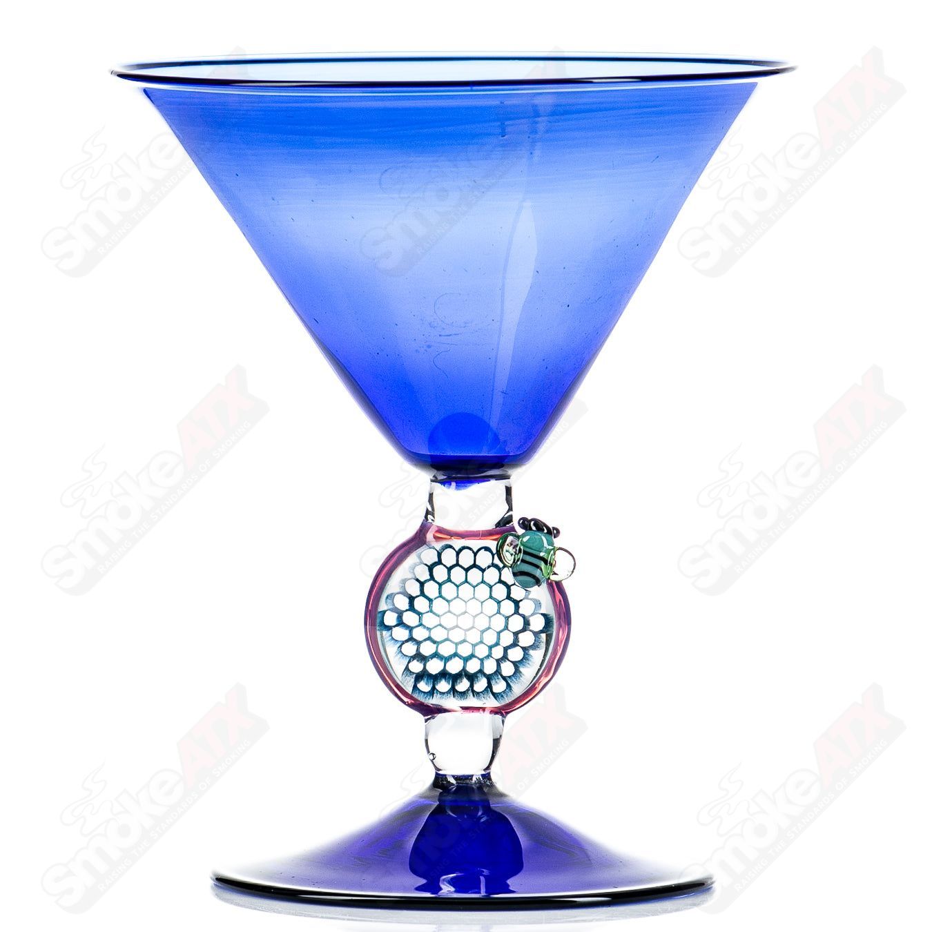 Heady glass honey-colored Martini glass from Joe P Glass, designed for cocktails, with a sleek, clear cup and stylish stem.