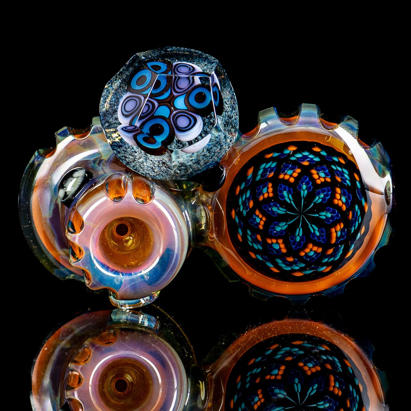 Hand pipe from Rotational Science's Heady Glass collection, featuring a Dottacello design with two pockets and colorful glass details.