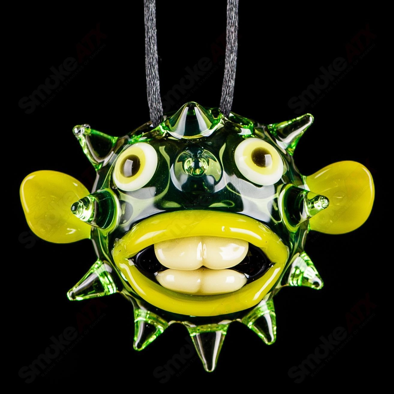 Chadd Lacy Glass Puffer Pendant in vibrant glass with intricate lacy design, hanging as a decorative heady glass pendant.