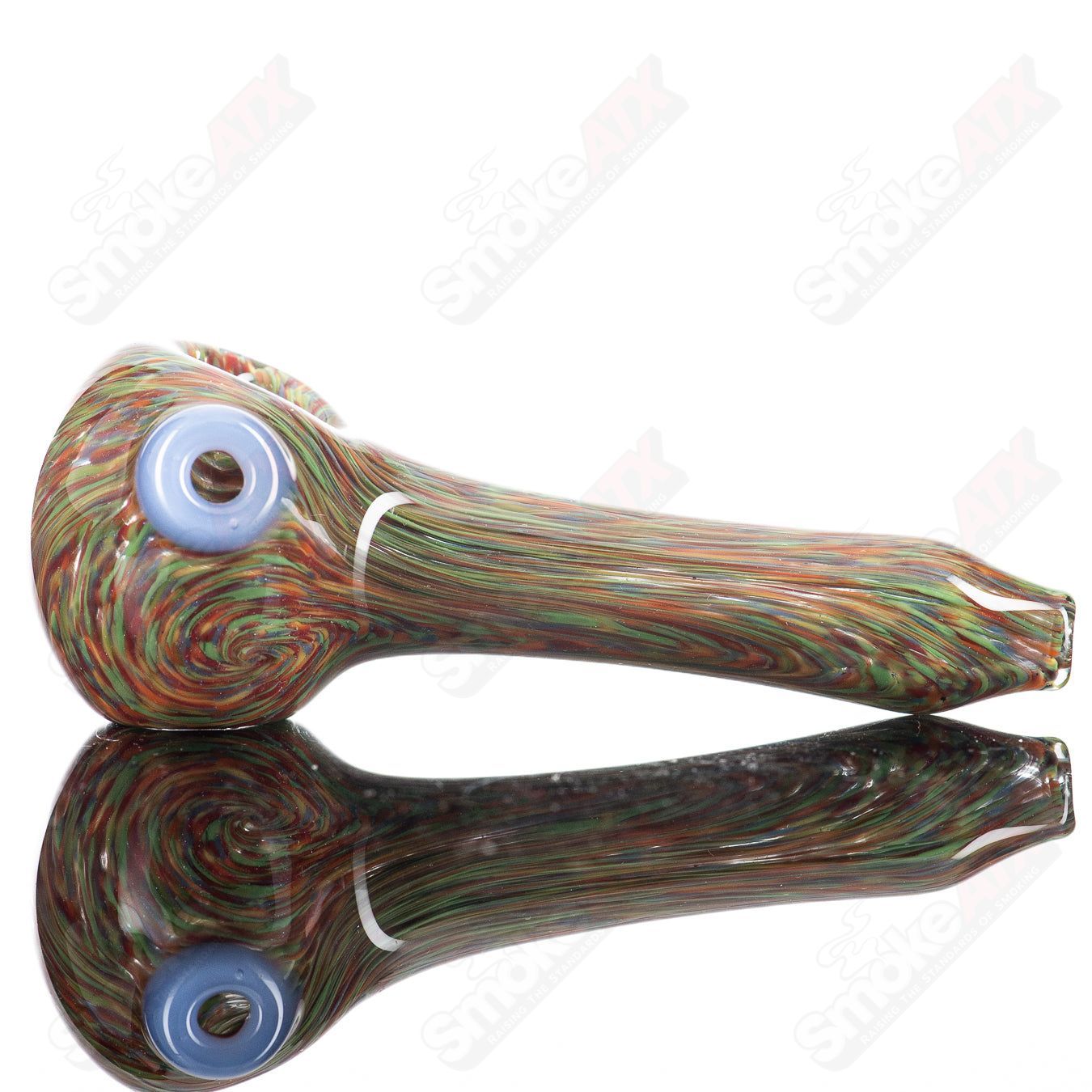 Colorful Rainbow Grit Reversal Spoon by JMK Glass, handcrafted glass hand pipe with vibrant rainbow design.