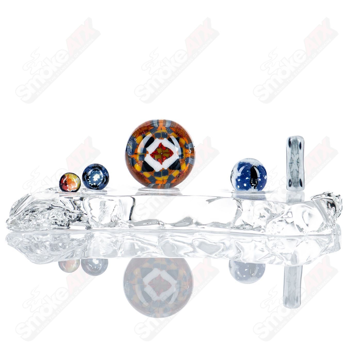 Cap’n Crunk Heady Glass Slurper Set featuring two colorful, textured glass slurpers with unique design details.
