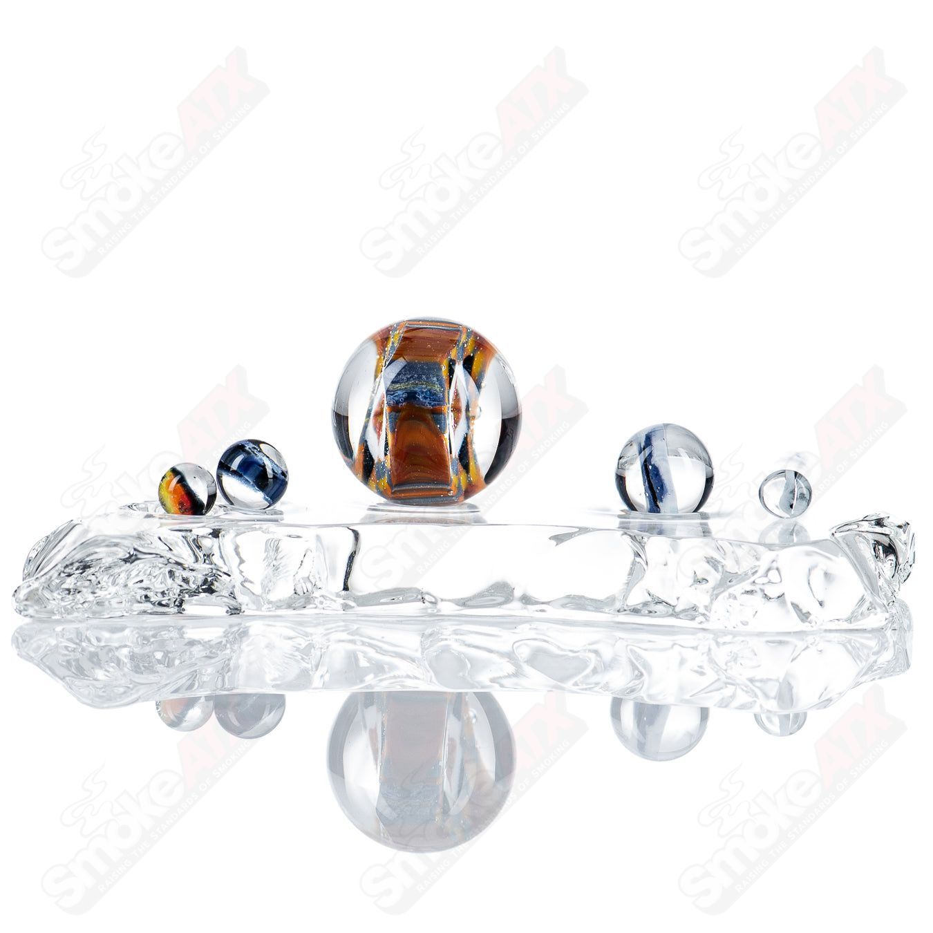 Cap’n Crunk Heady Glass Slurper Set featuring two unique, colorful glass slurper pipes with intricate designs.