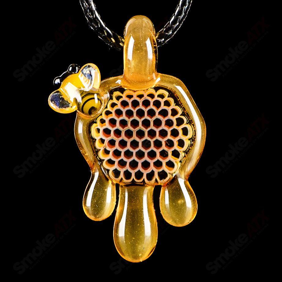 Small honeycomb drip pendant by Joe P Glass, colorful heady glass pendant with intricate honeycomb design and vibrant drip details.
