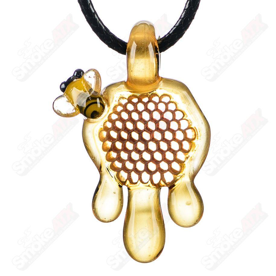 Small honeycomb drip pendant by Joe P Glass, colorful heady glass pendant with intricate honeycomb design and vibrant drip details.