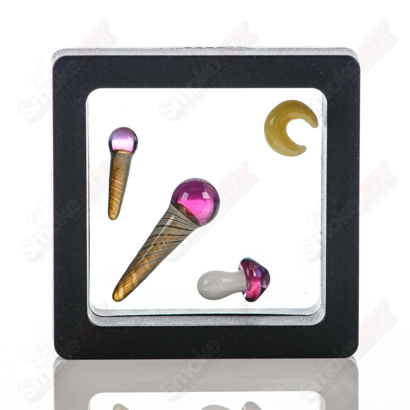 Phil Siegel Glass Heady Glass Terp Caster Set with pearls and inserts, showcasing intricate glass art and vibrant colors.