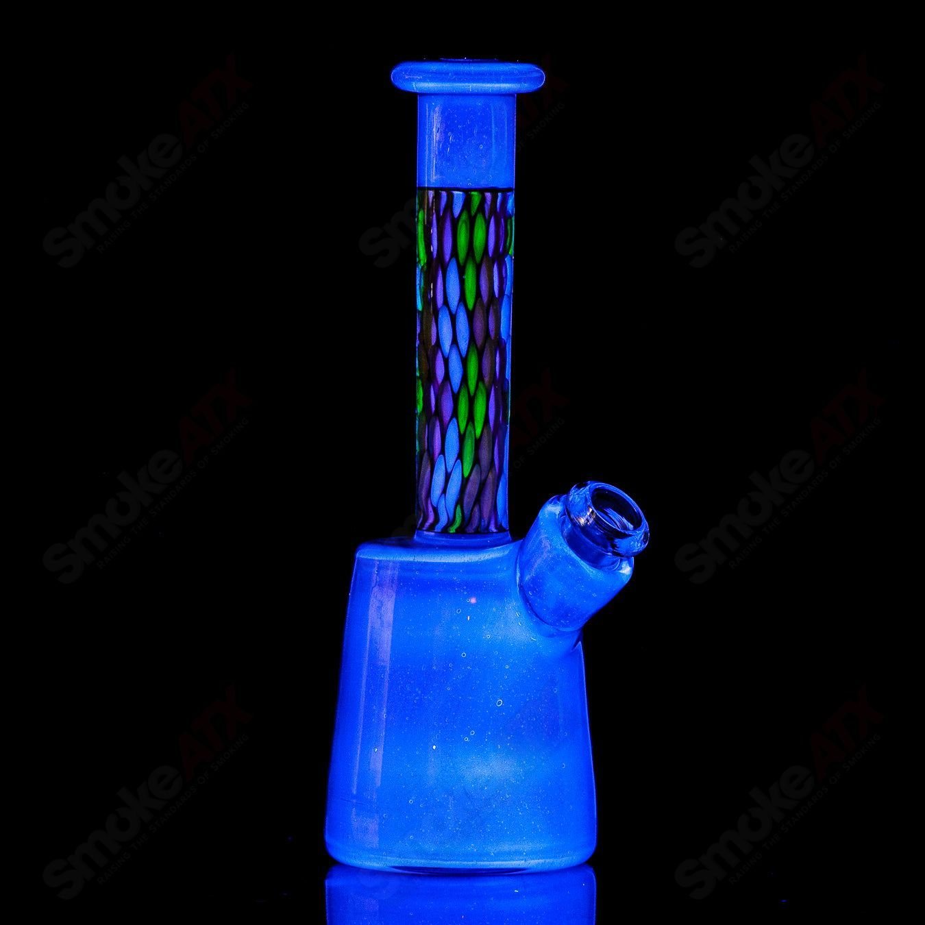 BCM Glass UV Mini Rig, a heady glass concentrate rig with vibrant UV-reactive accents and clear glass construction.