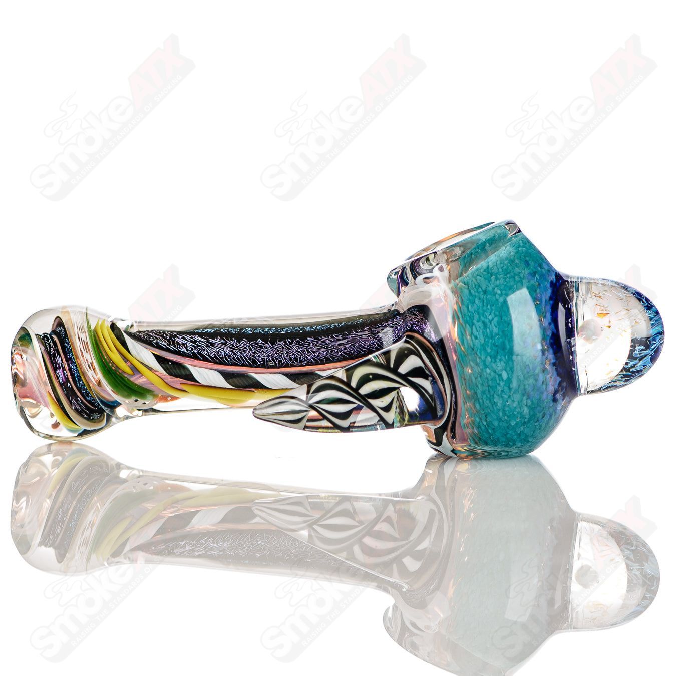 Colorfully worked IO spoon hand pipe by Jeremy from Oregon with vibrant 20-color design in heady glass style.