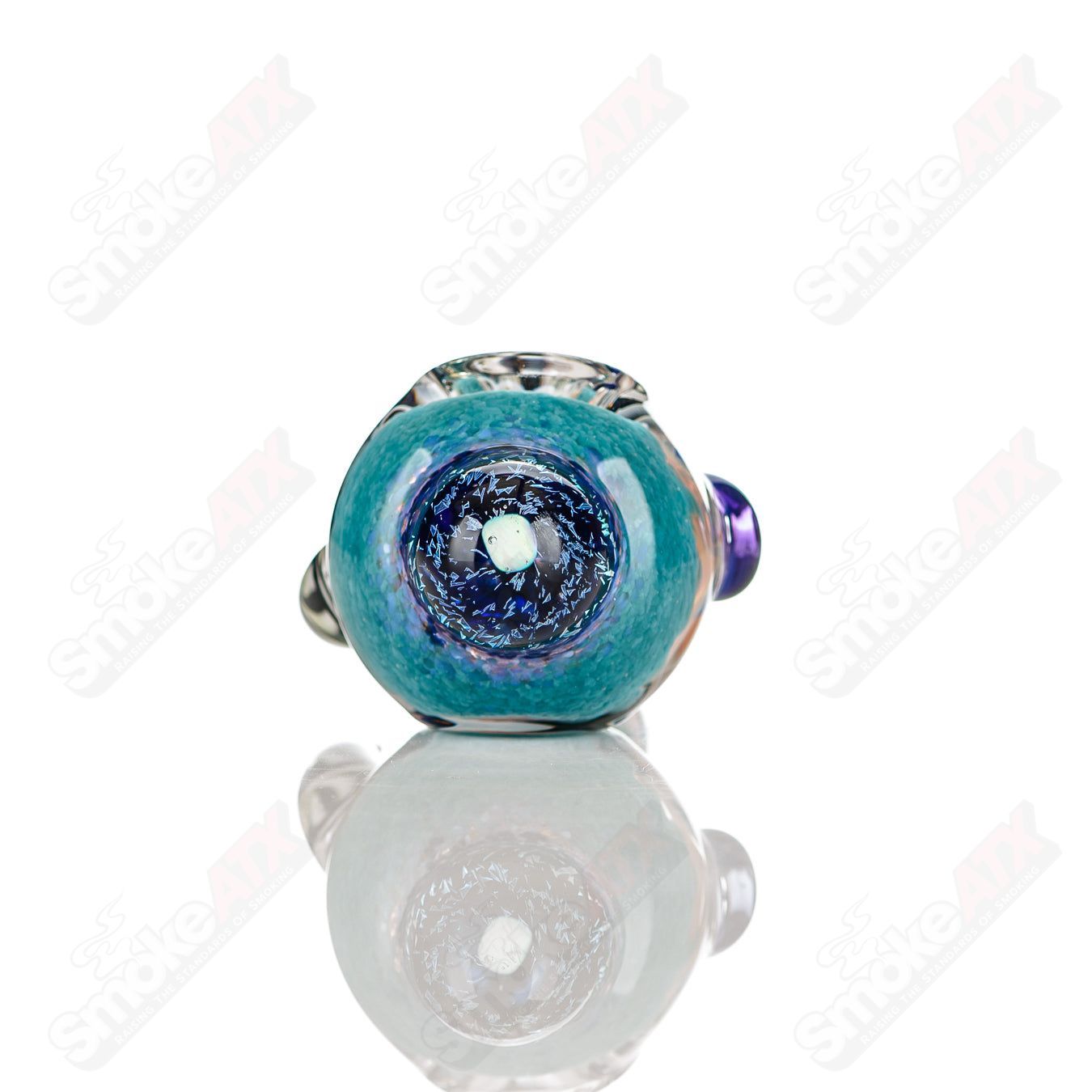 Colorfully worked IO spoon hand pipe by Jeremy from Oregon featuring 20 vibrant colors and intricate glass design.
