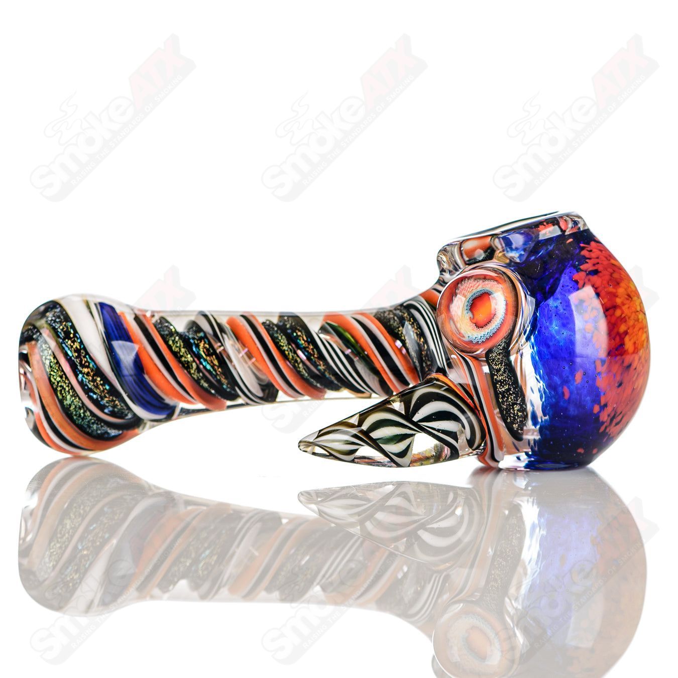 Colorfully worked IO spoon hand pipe by Jeremy from Oregon featuring 21 vibrant colors and intricate glass design.