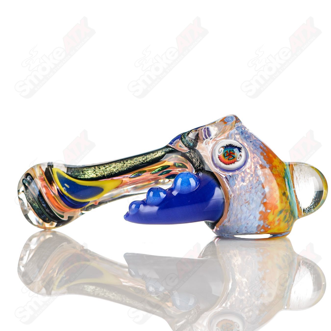 Colorful worked IO hammer hand pipe by Jeremy from Oregon featuring vibrant 22-color glass design and intricate craftsmanship.