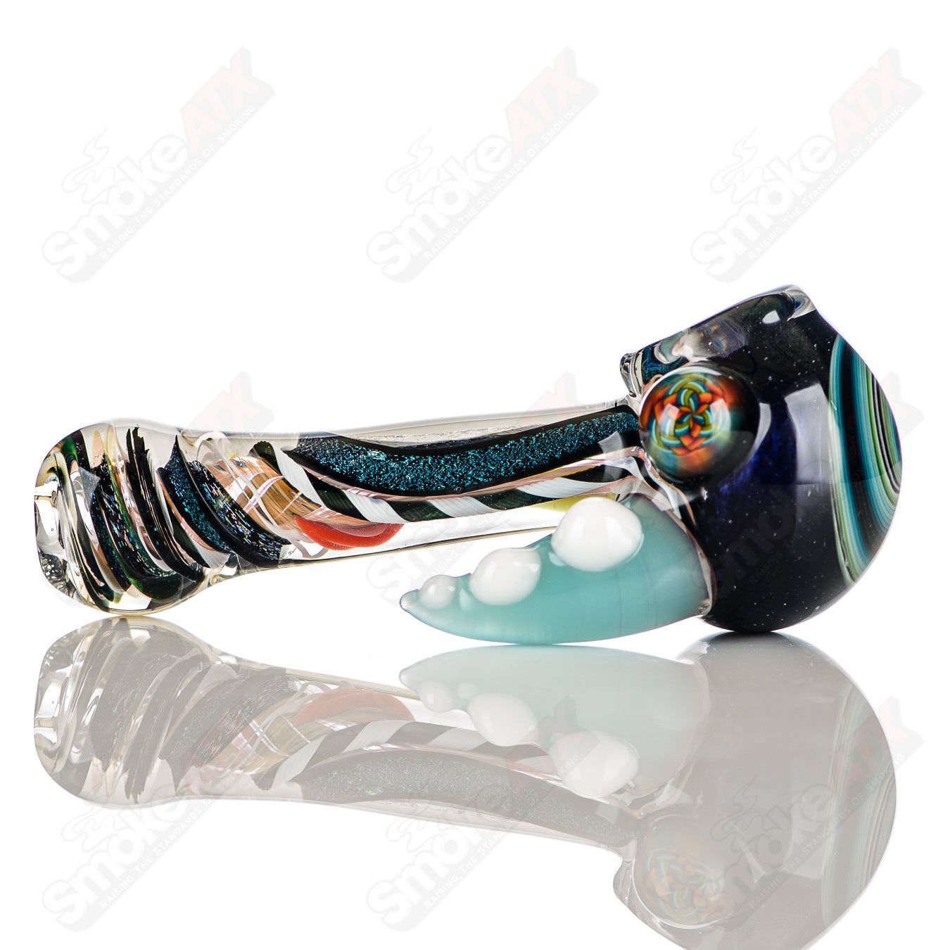 Color worked IO spoon hand pipe by Jeremy from Oregon featuring vibrant 23-color design and intricate glasswork.