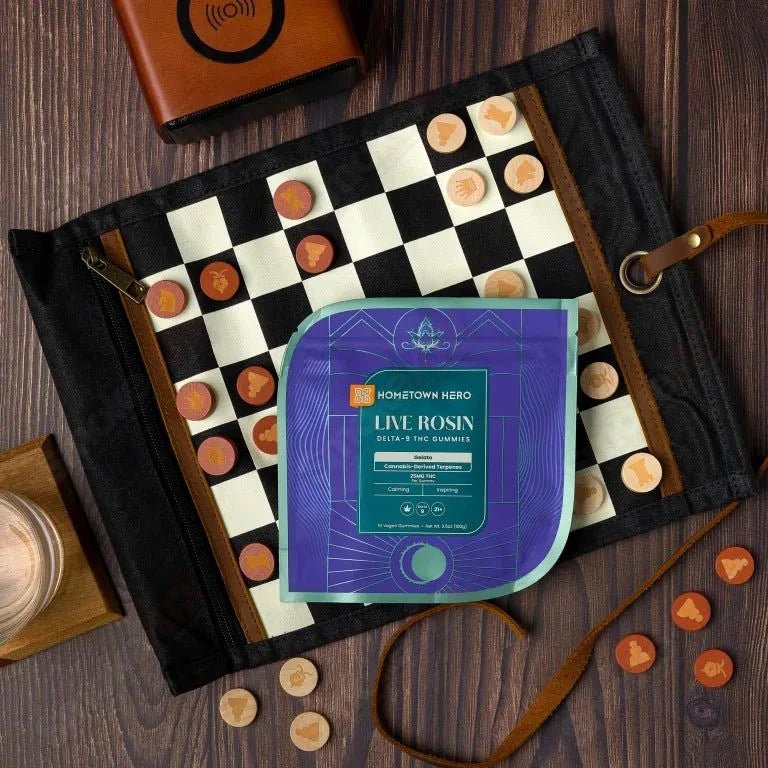 Hometown Hero Gelato Delta-9 live rosin gummies, 250mg hemp edibles with colorful gummy candies on a white background.