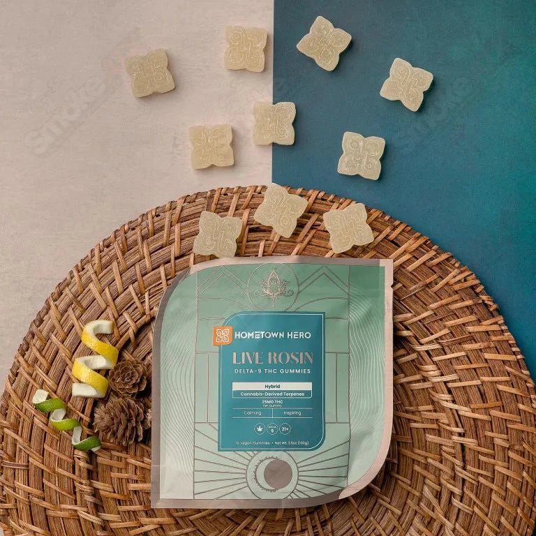 Hometown Hero 250mg hybrid Delta-9 live rosin gummies, hemp THC edibles, featuring colorful gummy candies on a white background
