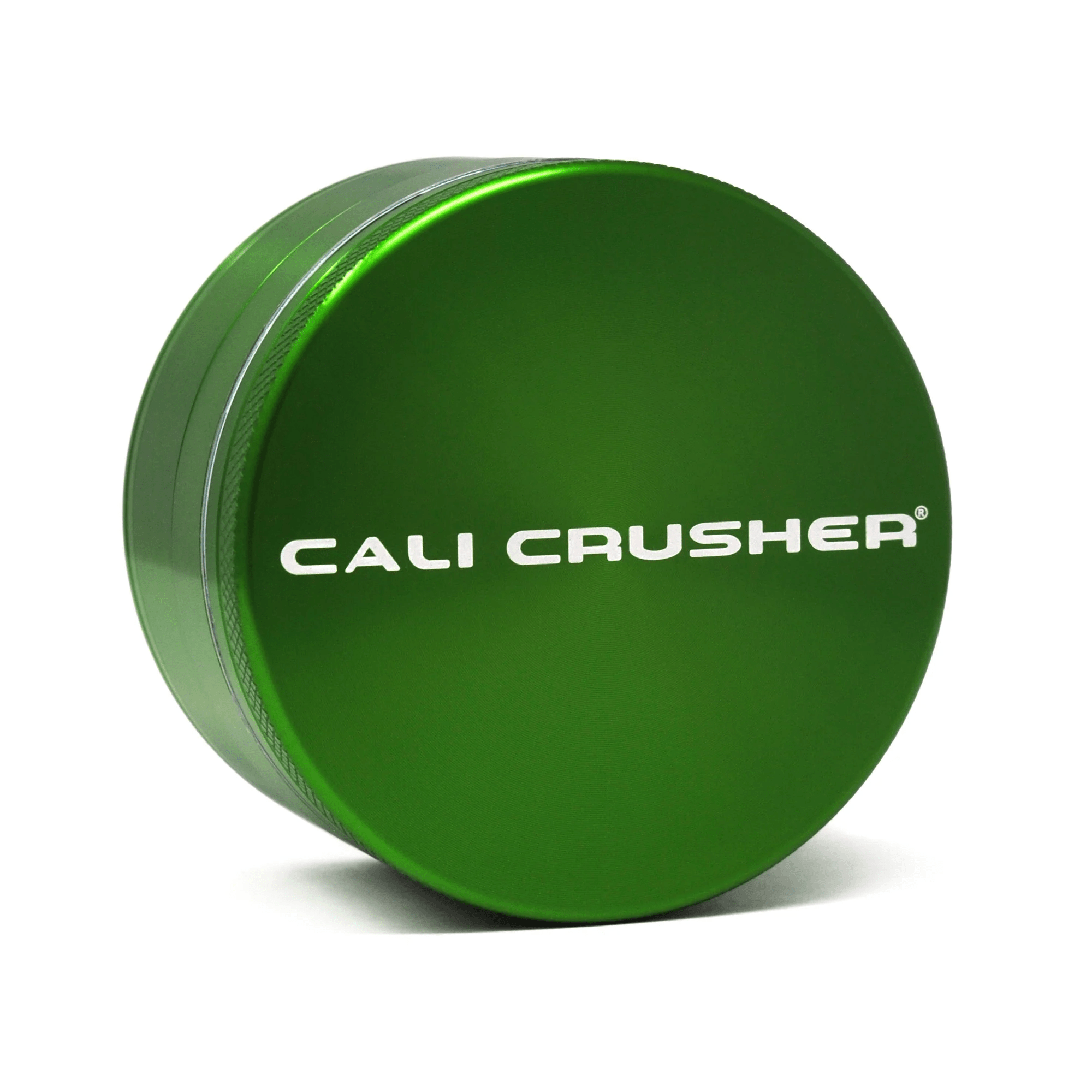 Green Cali Crusher 2.5-inch 4-piece metal grinder with hardtop lid, designed for efficient herb grinding and storage.