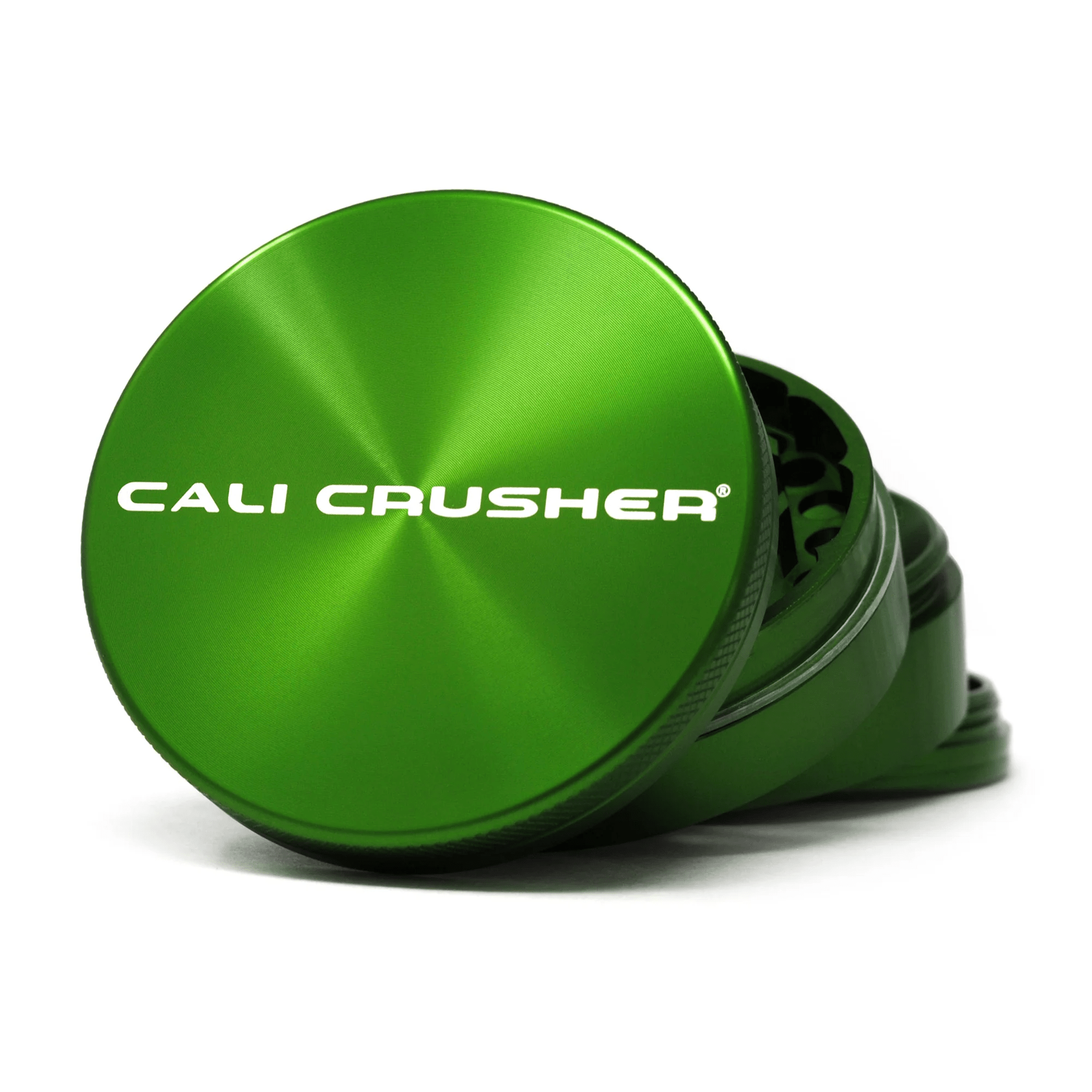 Green 2.5-inch Cali Crusher 4-piece hardtop metal grinder with sharp teeth for efficient grinding of herbs and spices.