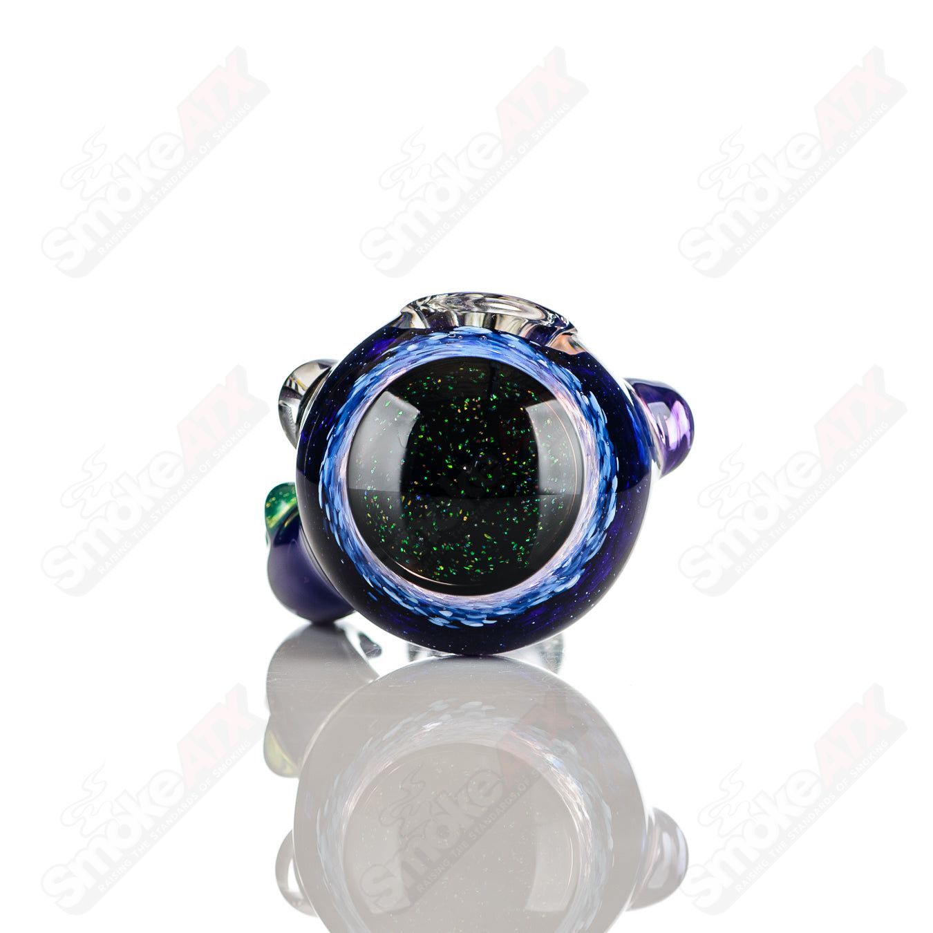 Color-worked IO spoon pipe by Jeremy from Oregon, handcrafted heady glass hand pipe with vibrant multi-colored design.