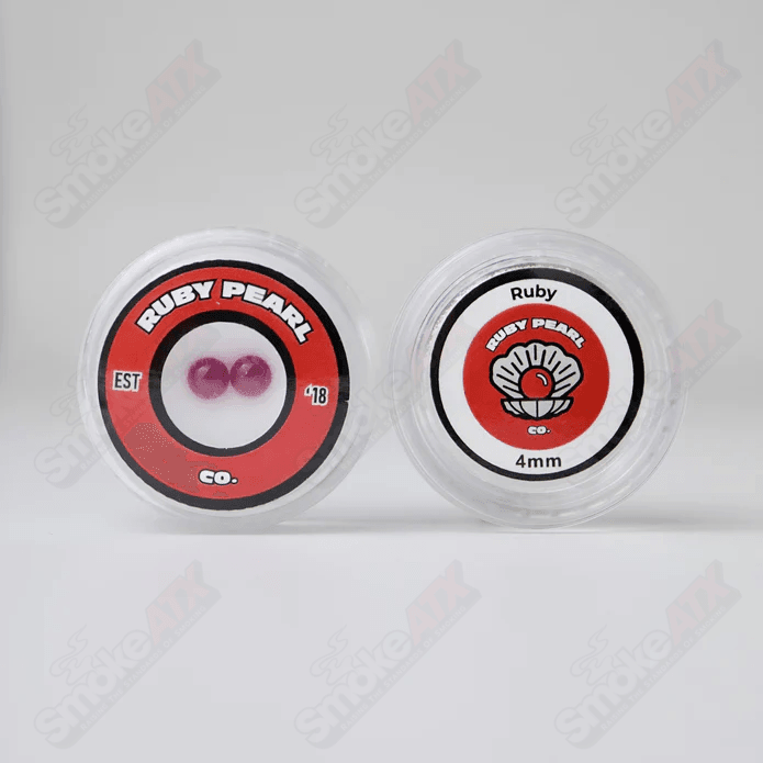 Two 4mm glass ruby pearl beads from Ruby Pearl Company, round and vibrant red with a smooth surface for jewelry making.