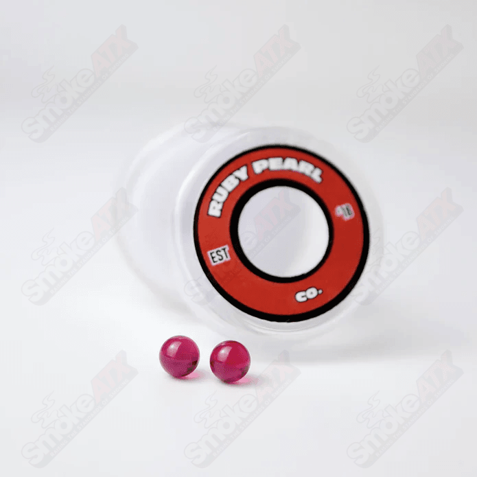 Two 5mm Ruby Pearls by Ruby Pearl Company, glass pearls with a rich red color, perfect for jewelry making or decorative crafts.