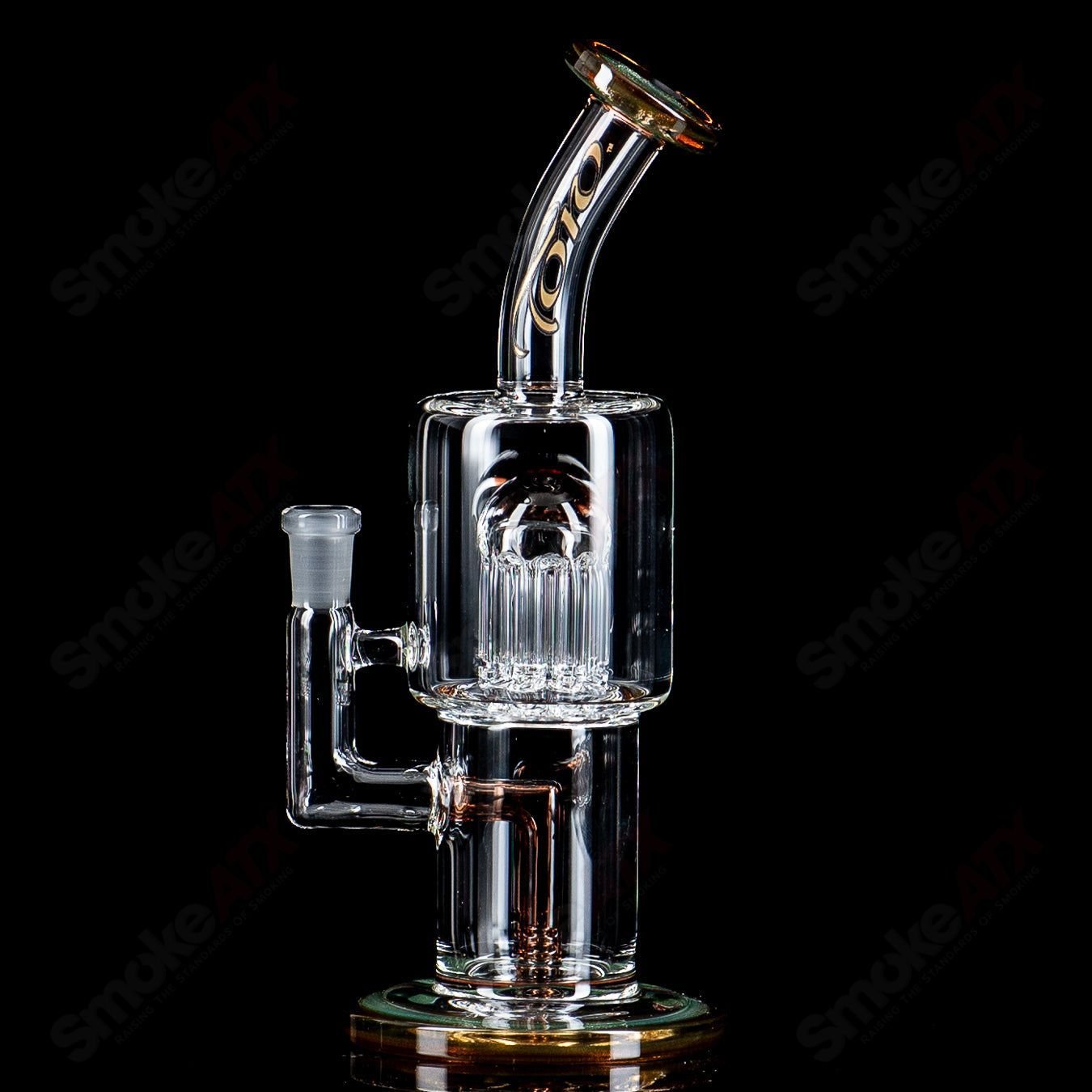 Toro Glass 10mm Double Macro concentrate rig with colorful caps, featuring intricate glass design and sturdy construction.