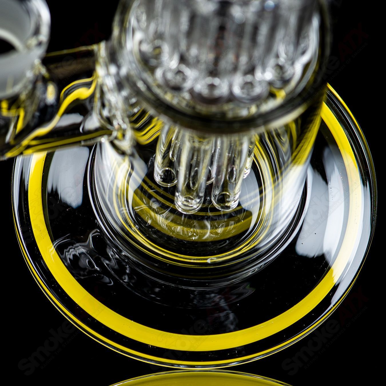 Toro glass straight tube with 18mm 7/13 arm perc and reversal caps, featuring clear glass design for smooth hits.