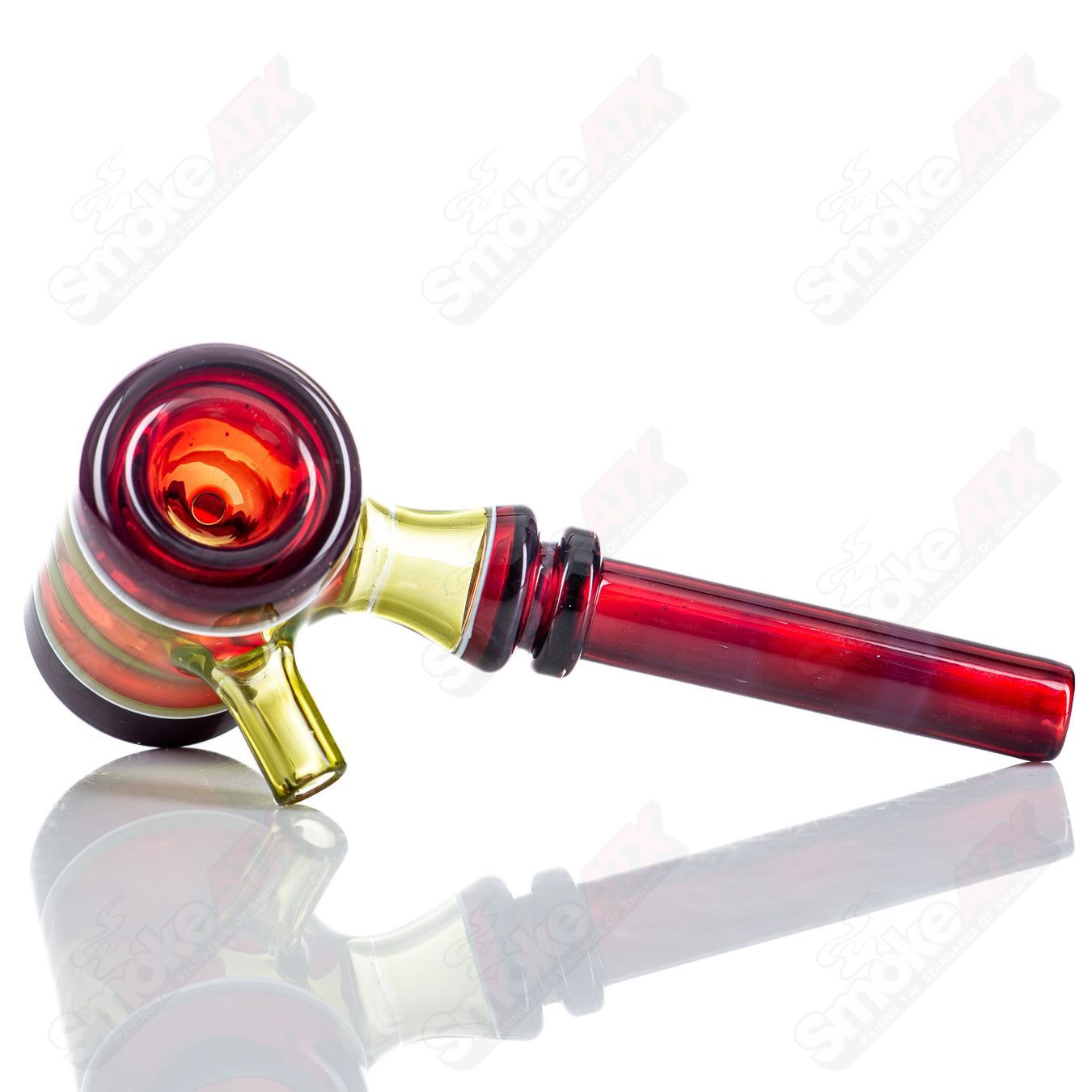 Colorful Kirkland Glassworks 3-Color Poker heady glass hand pipe with vibrant multi-colored design and clear glass accents.