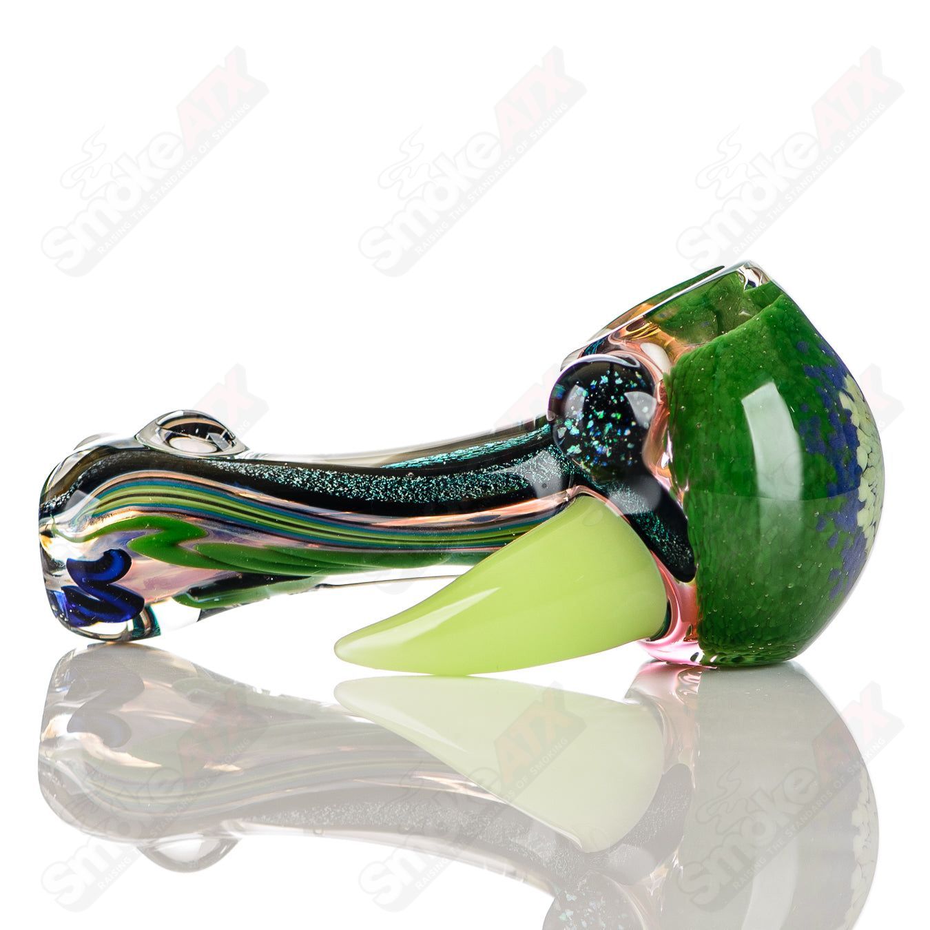 Hand pipe by Jeremy from Oregon featuring 3-color worked IO spoon design, made of heady glass with vibrant color accents.
