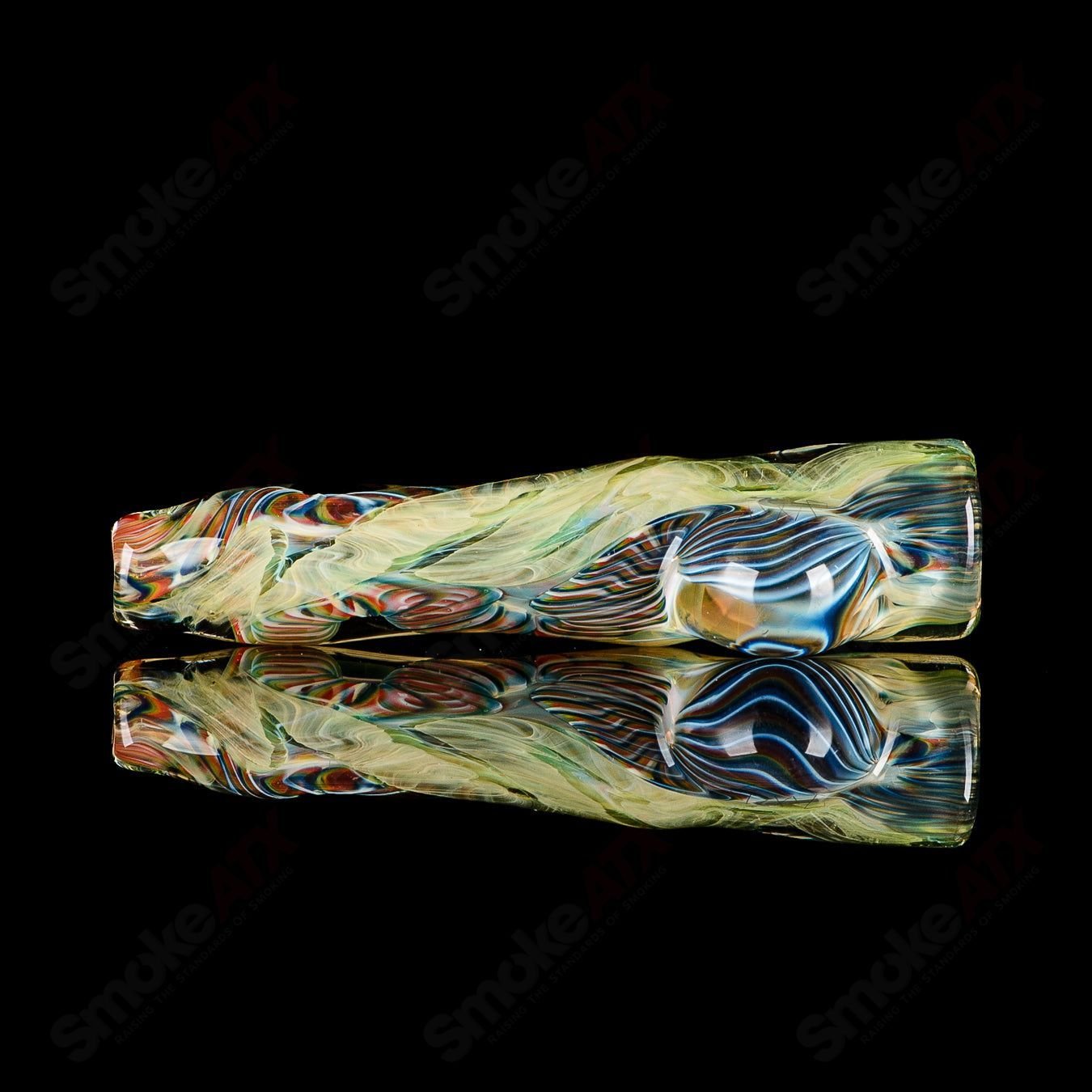 Handcrafted JMK Glass #3 I/O Worked Chillum with signed design, made of clear glass, showcasing intricate worked details.