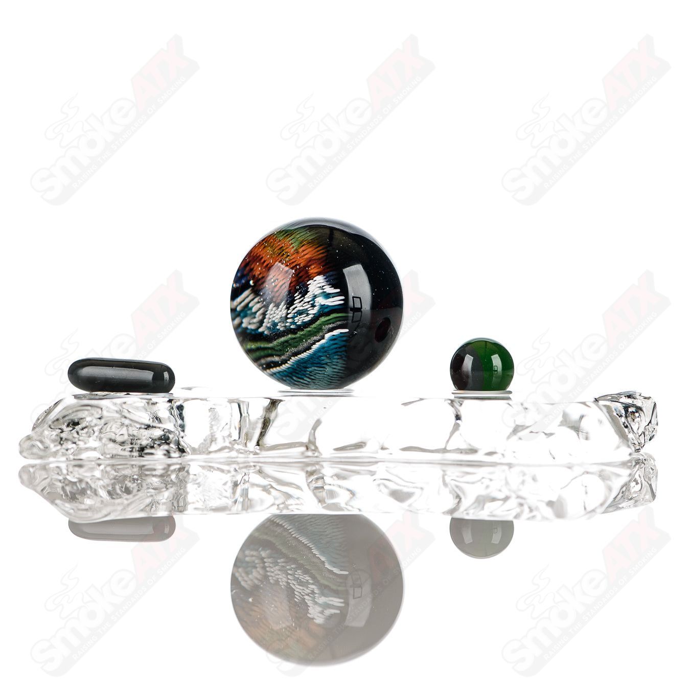 JH Glassworks Mountain Slurper Marble Heady Glass Slurper Set with vibrant colored marble accents and intricate glass design.