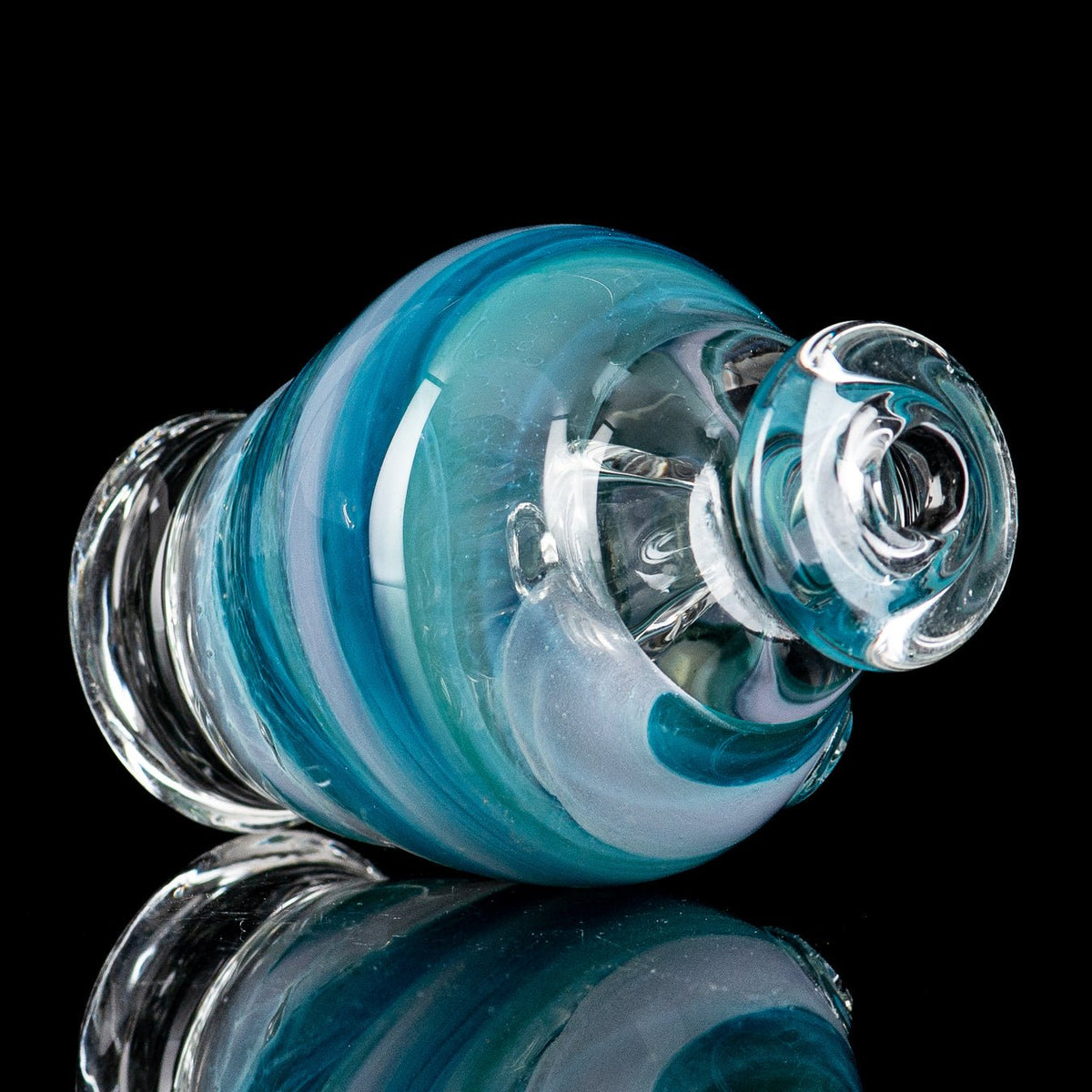 Close-up of the Puffco Wet Top glass accessory by Nobody Glass, featuring intricate glasswork and a transparent design.