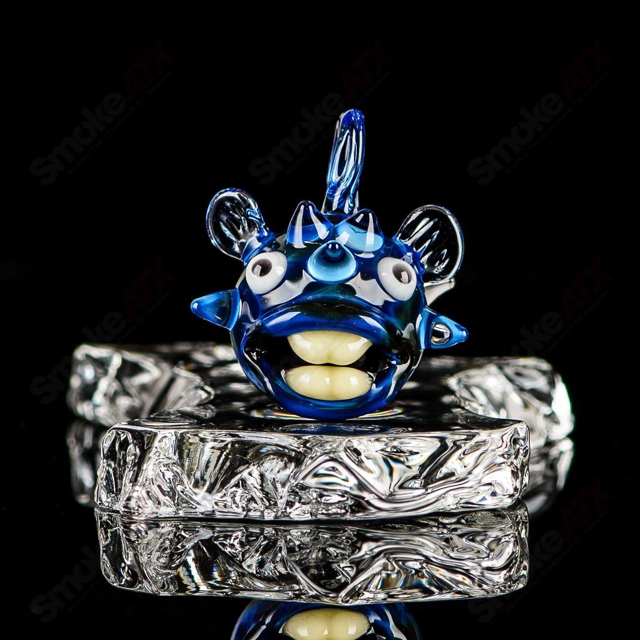 Chadd Lacy Glass heady pendant featuring a marble puffer slurper design with colorful glass accents.