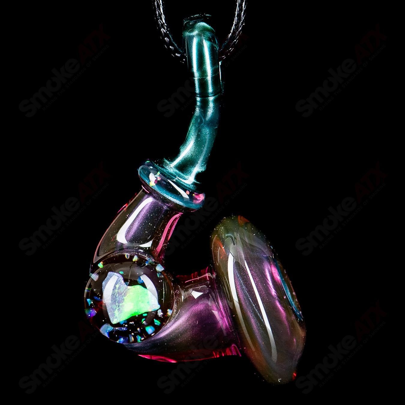 JMass Sherlock pendant with a heart-shaped opal glass accent, featuring intricate heady glass design and vibrant colors.