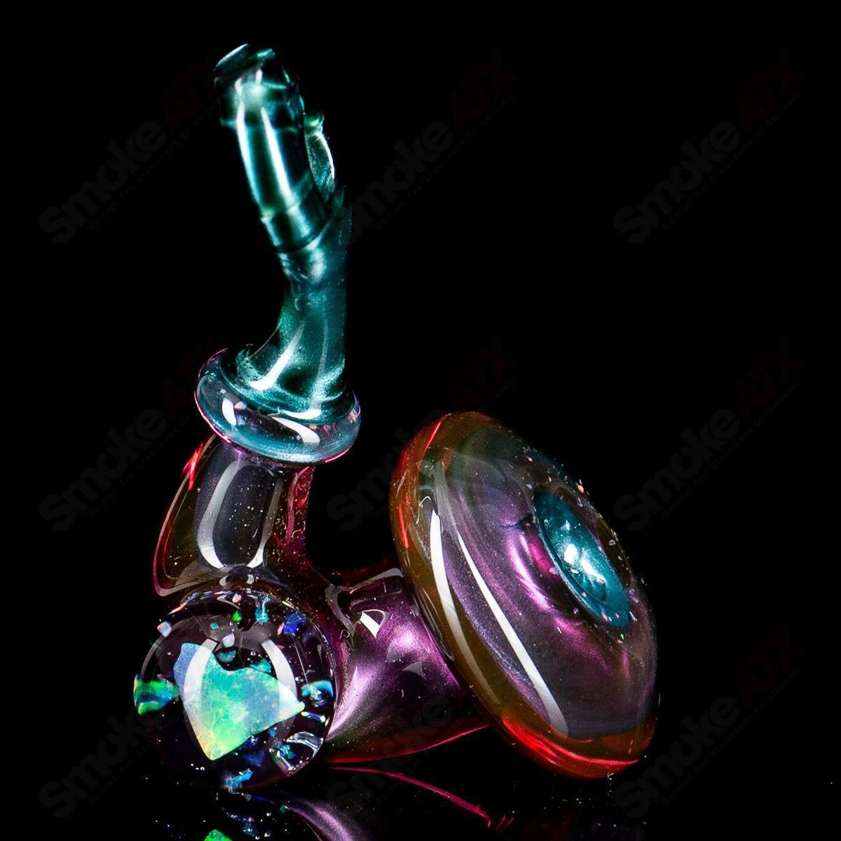 JMass Sherlock pendant with heart-shaped opal, crafted from heady glass, features intricate details and vibrant colors.
