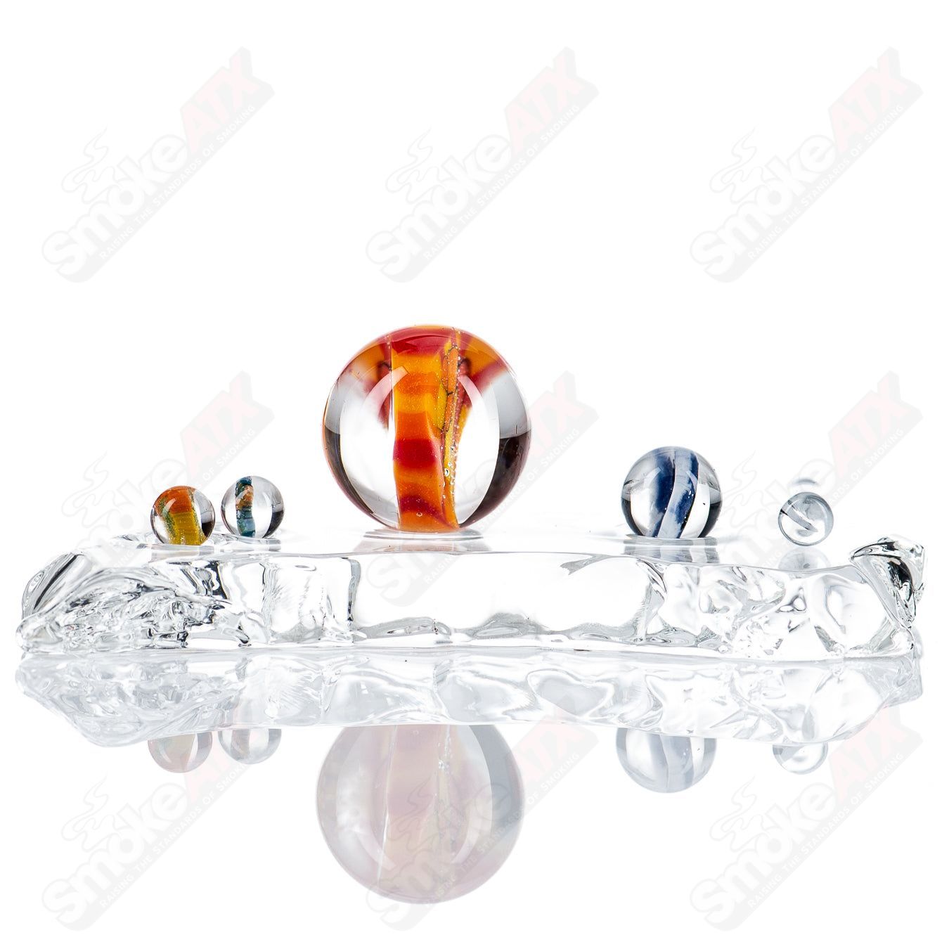 Cap’n Crunk Heady Glass Slurper Set featuring three colorful glass slurper pipes with unique designs and vibrant accents.