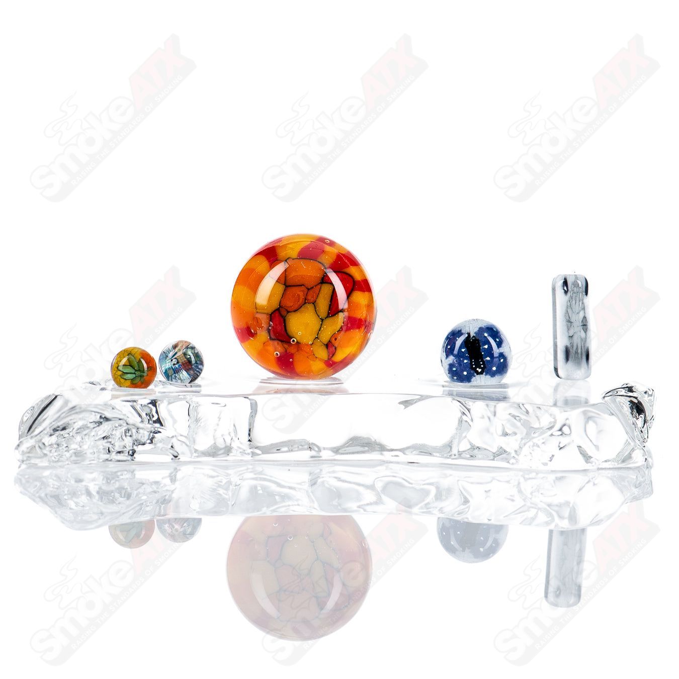 Cap’n Crunk Heady Glass Slurper Set with three colorful glass slurpers for dabbing and vaporizing concentrates.