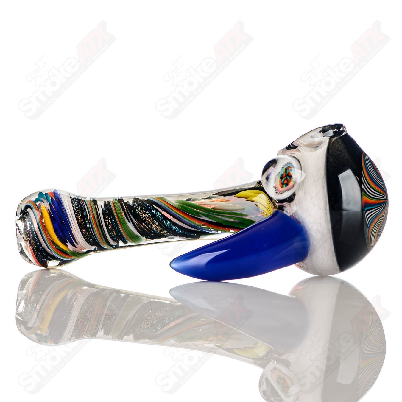 Colorfully worked IO spoon hand pipe by Jeremy from Oregon featuring 30 vibrant colors and intricate glass design.