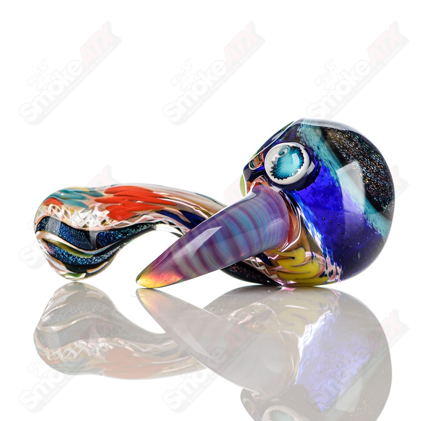 Colorfully worked IO spoon pipe by Jeremy from Oregon, handcrafted heady glass hand pipe with vibrant 31-color design.