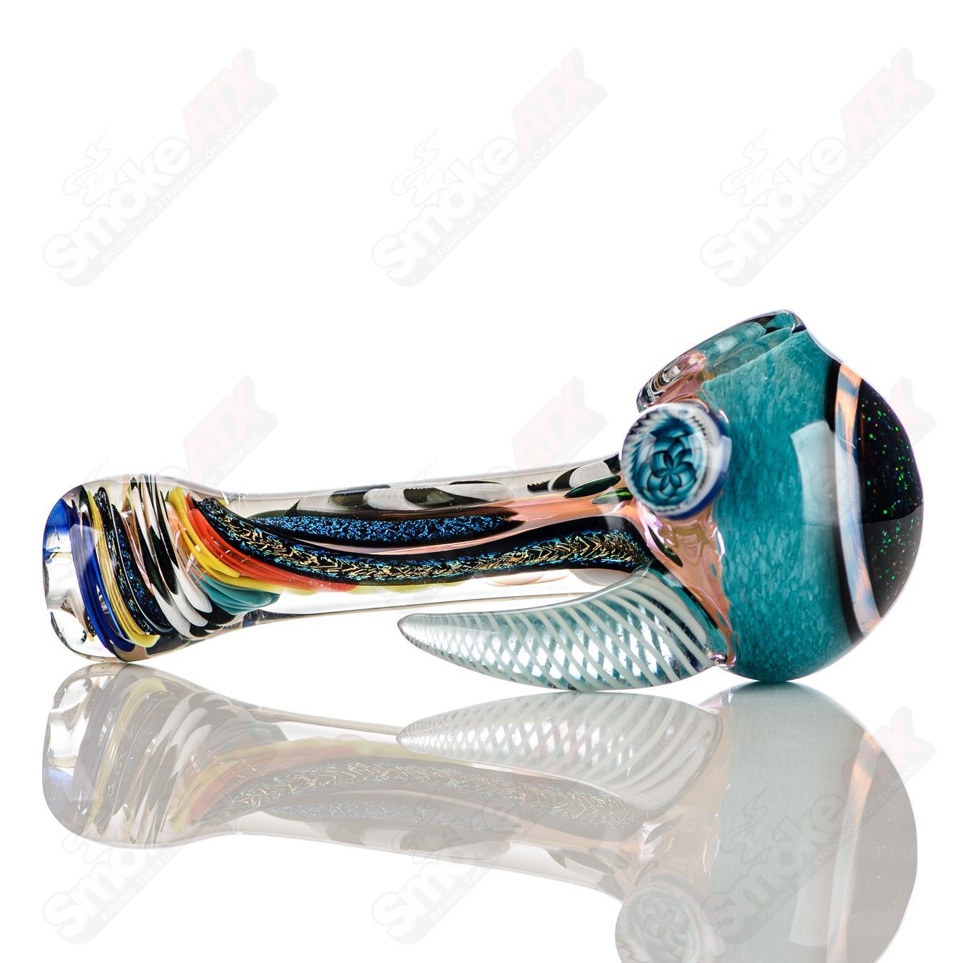 Color worked IO spoon pipe by Jeremy from Oregon, handcrafted heady glass hand pipe with vibrant 33-color design.