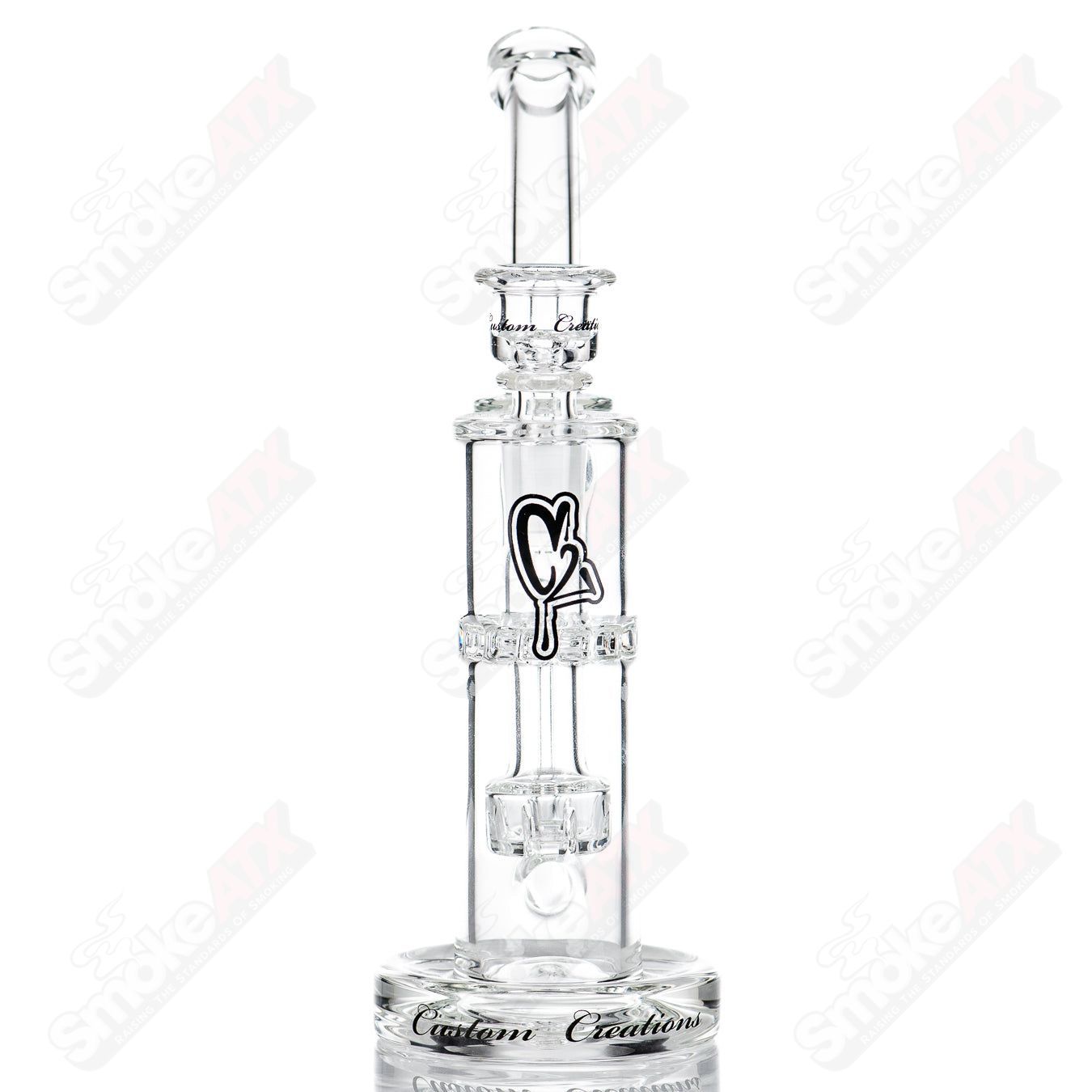 38mm C2 Custom Creations glass recycler with circular to ratchet perc design, showcasing intricate glasswork and vibrant colors.