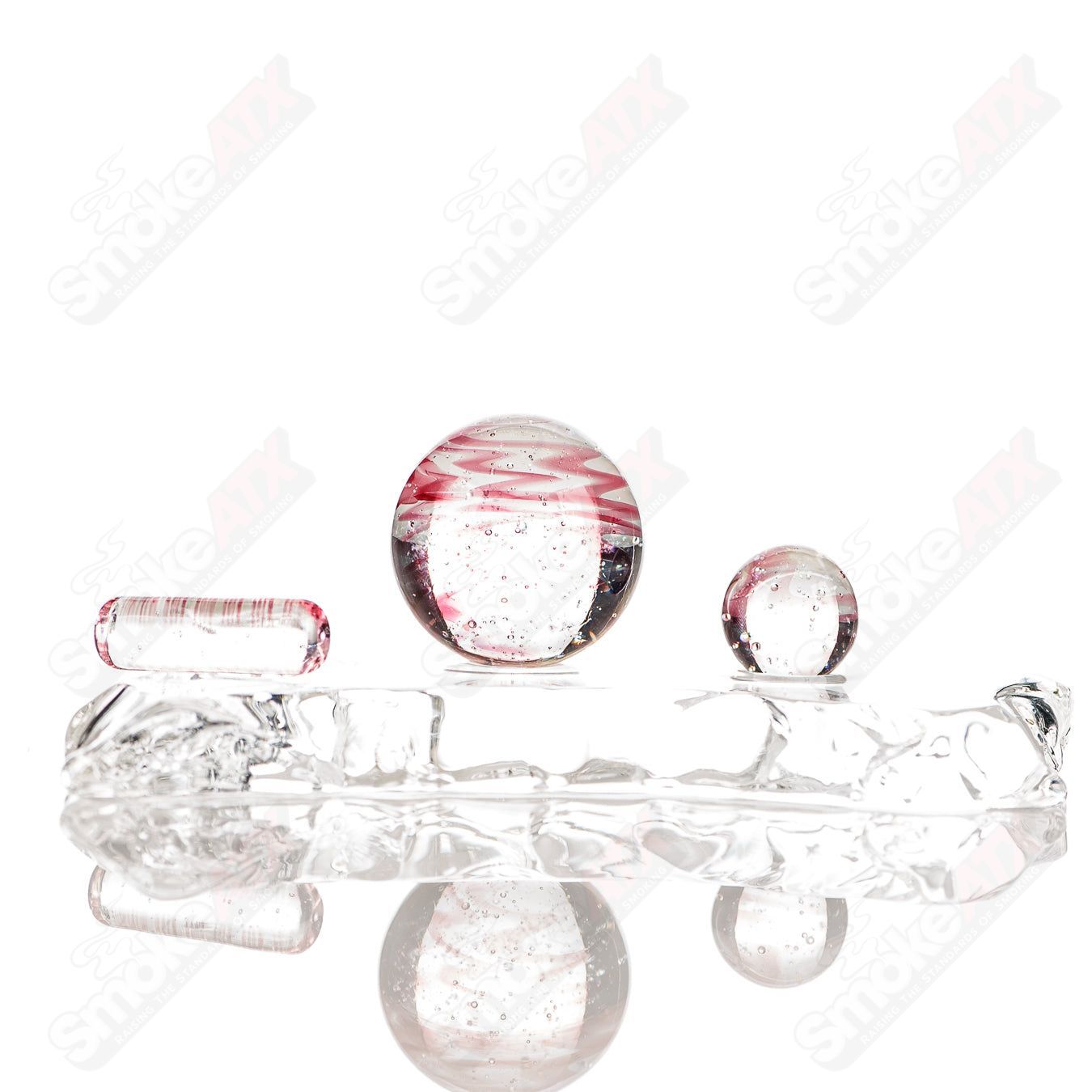 Three-piece UV Glow Cropal slurper set by Indo Glass featuring gold ruby and blue lava glass accessories for smoking.