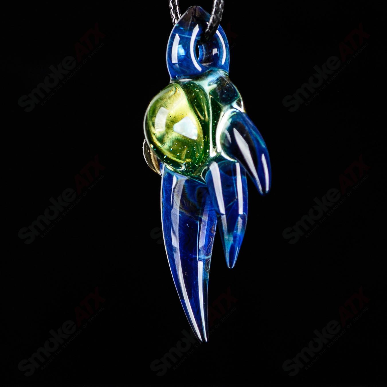 Dosh Glass #4 Amulet Pendant featuring intricate glass design, hanging as a stylish heady glass pendant jewelry piece