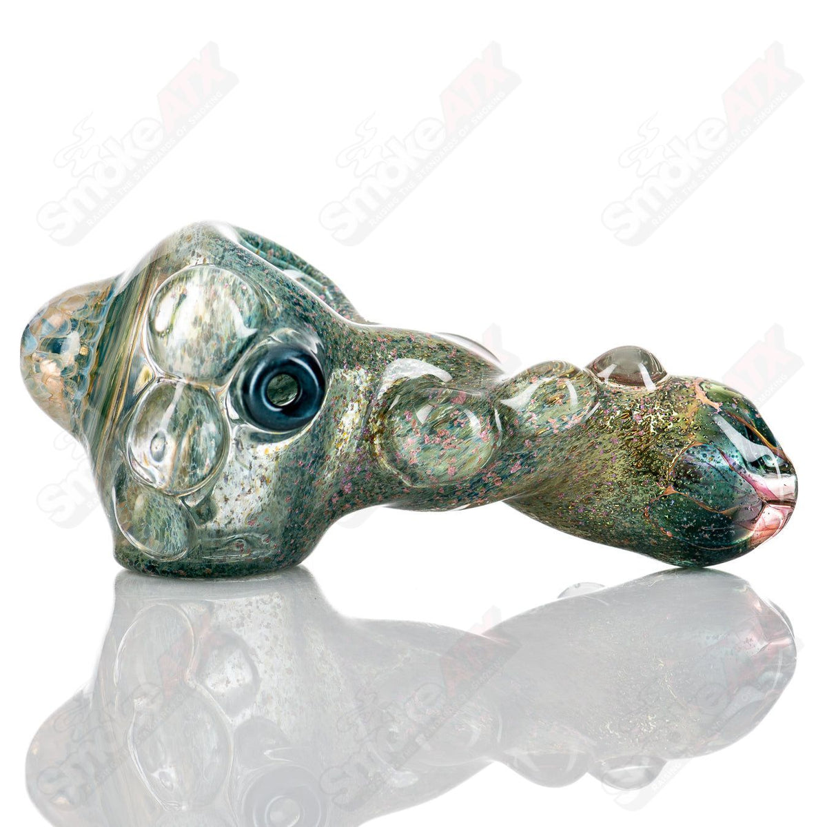 Molten Imagination Dragon Skin hand pipe with honeycomb design, made of glass, showcasing intricate dragon scale details.