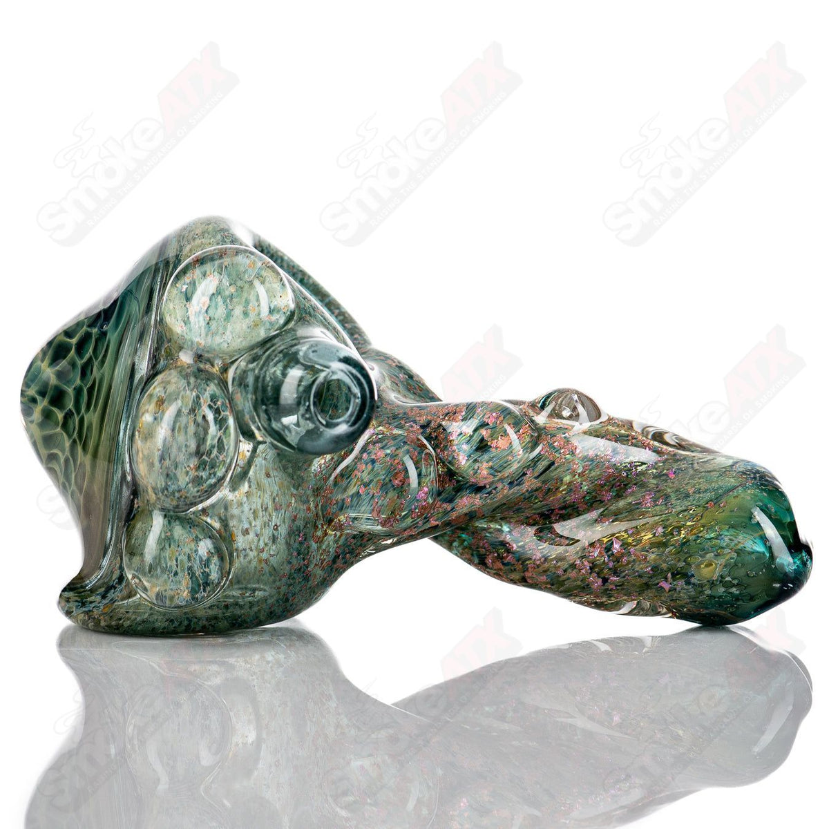 Molten Imagination Dragon Skin glass hand pipe with honeycomb design, featuring vibrant colors and intricate dragon scale details.