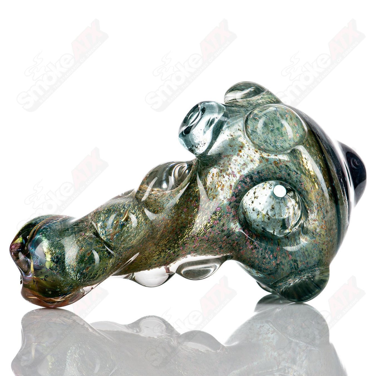 Molten Imagination Dragon Skin glass hand pipe with honeycomb design, featuring detailed dragon scale pattern and clear glass accents.
