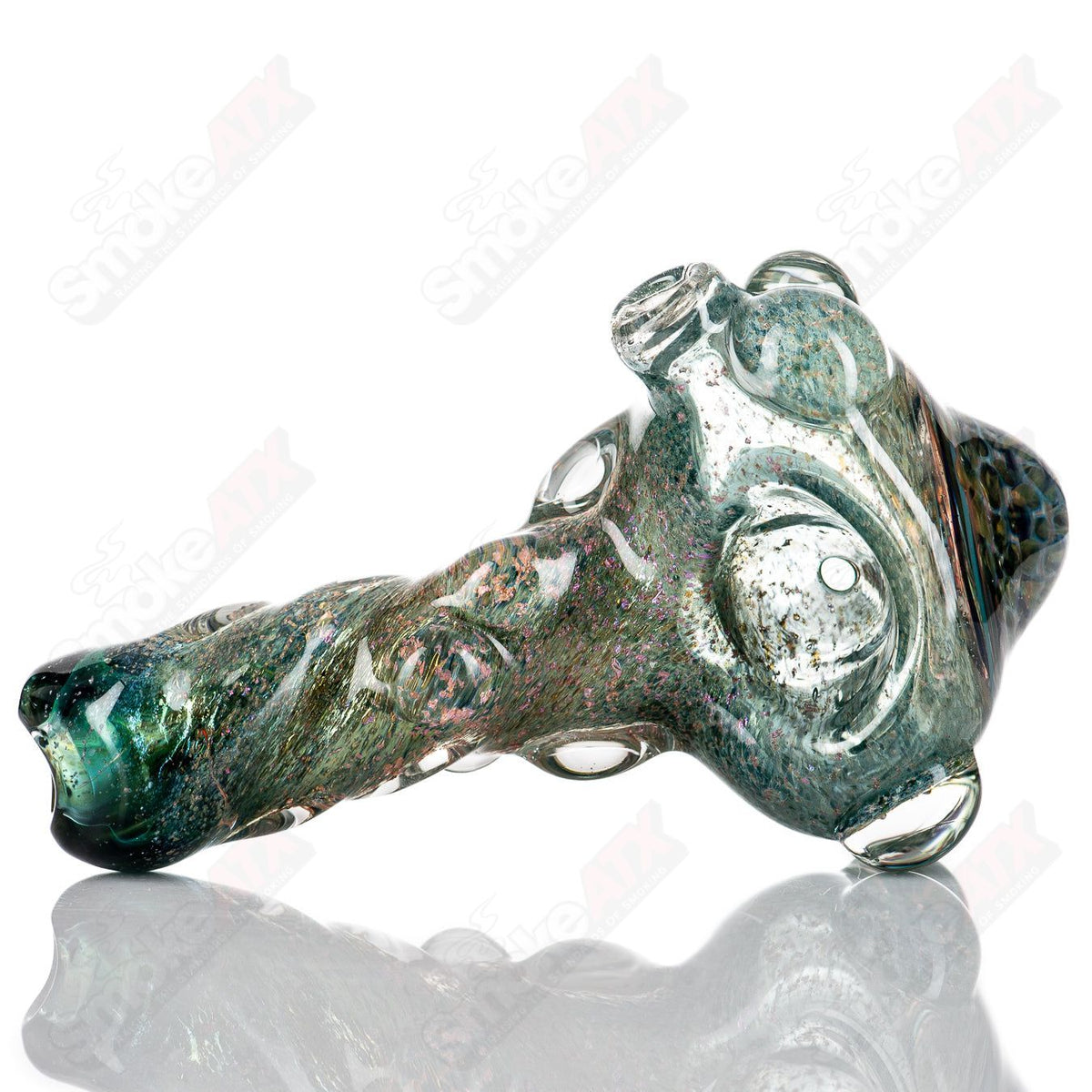 Molten Imagination Dragon Skin glass hand pipe with honeycomb design, vibrant colors and intricate dragon scale pattern.