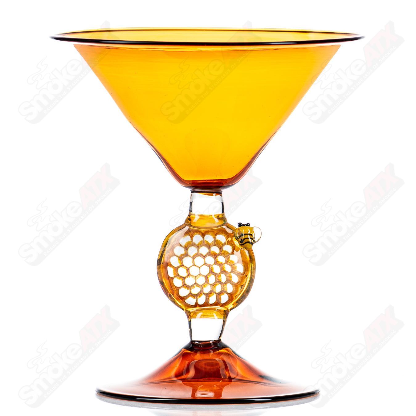 Heady Glass Martini Honey Glass by Joe P Glass, a clear cup with honey-colored accents, designed for beverage enjoyment.