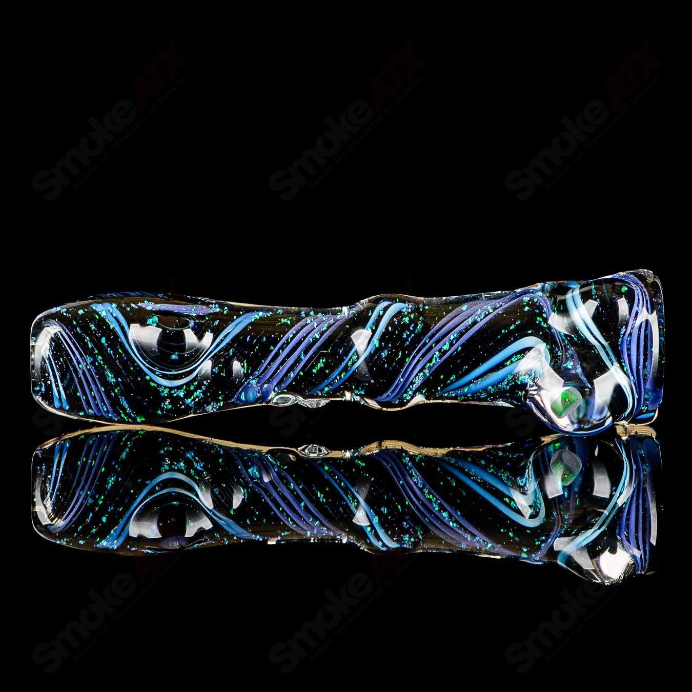 Glass chillum by Rotational Science featuring a vibrant opal hitter design, showcasing colorful and detailed glass artwork.