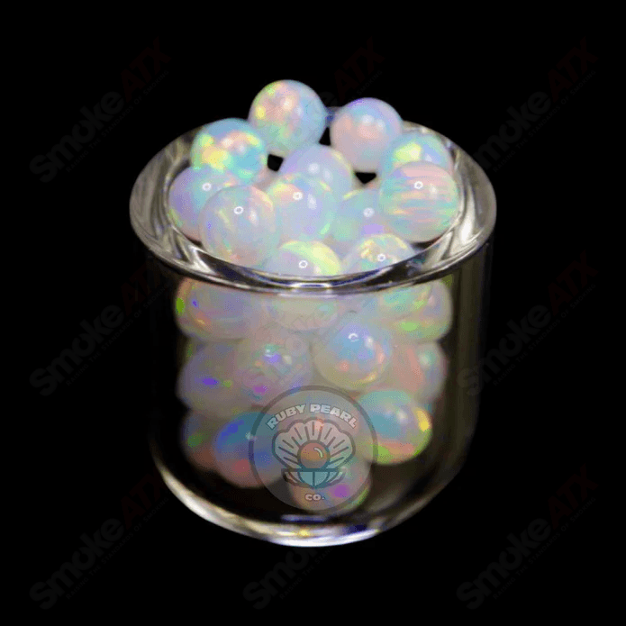 4mm white opal pearl and ruby pearl glass beads from Ruby Pearl Company, showcasing smooth round pearls with vibrant color accents.