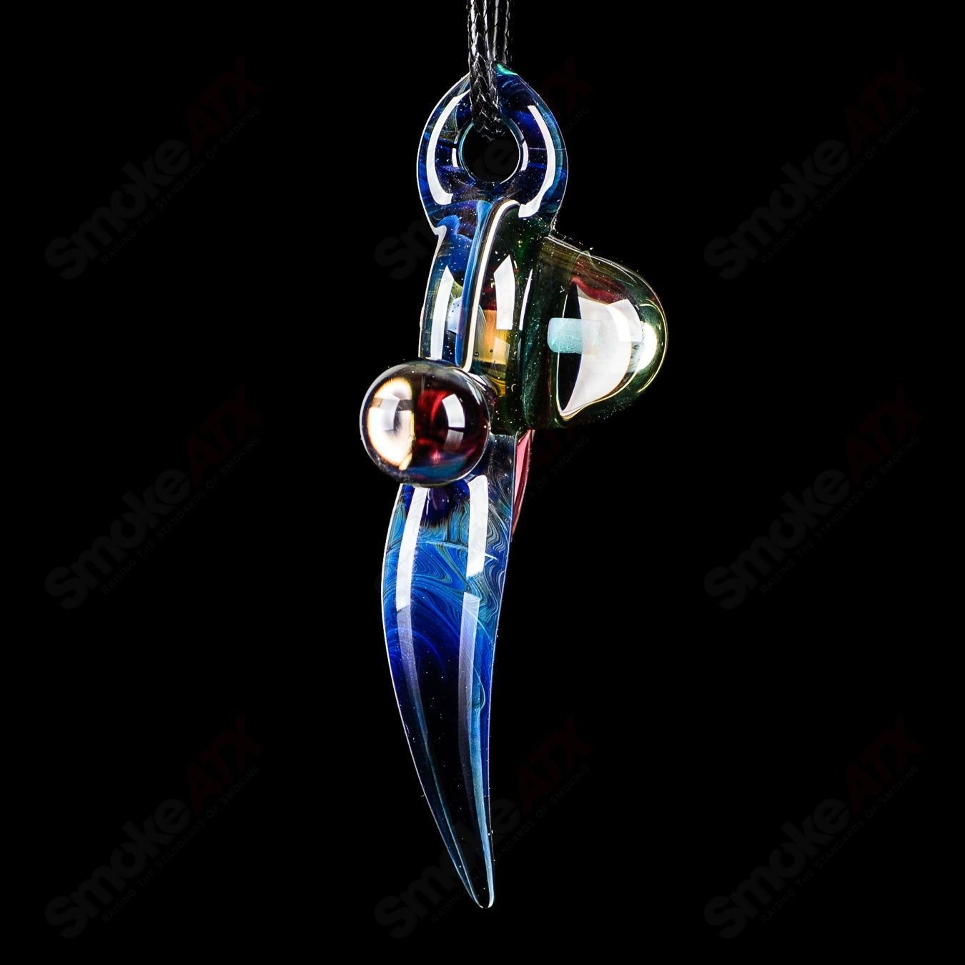 Colorful Dosh Glass #5 Amulet Pendant featuring intricate glasswork, designed as a stylish heady glass pendant.